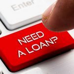 Person looking for bad credit loans on the internet