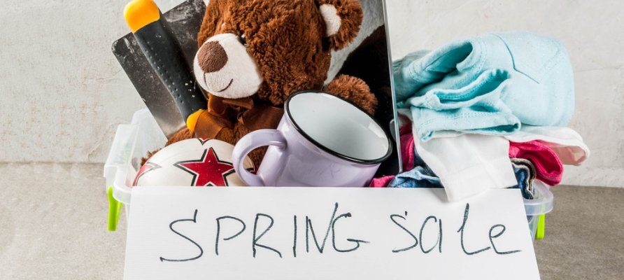 Box of unwanted items being sold during spring cleaning